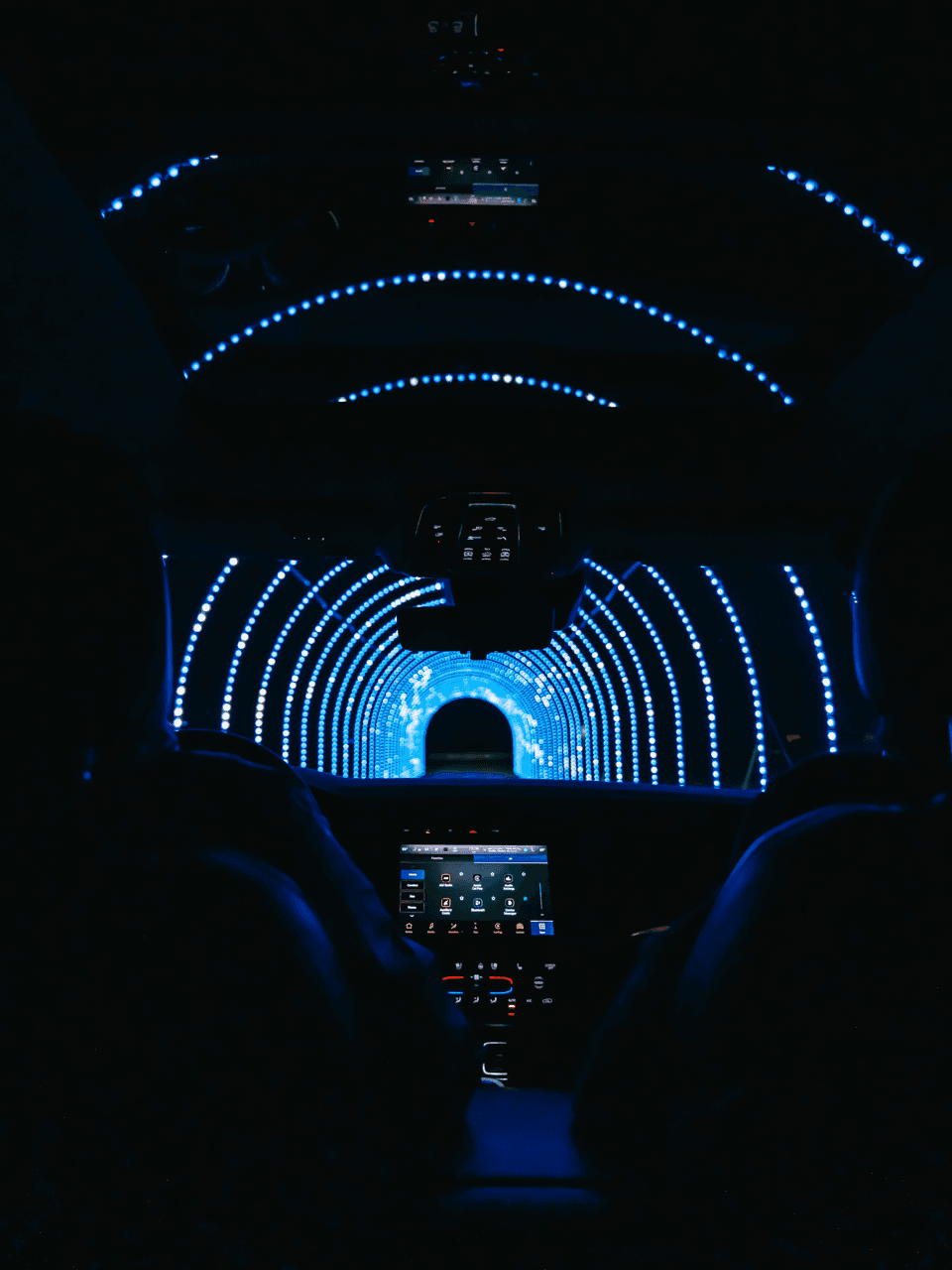 View from inside car of LED light tunnel synchronized with music
